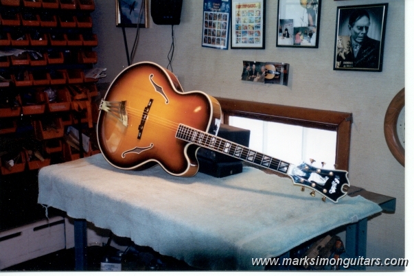 67d'aquistobenchbig.jpg - 1967 D'Aquisto New Yorker Deluxe serial #1016. The first example of D'Aquisto's guitars to stray from John D'Angelico's design. Note the "new style" tailpiece and headstock.