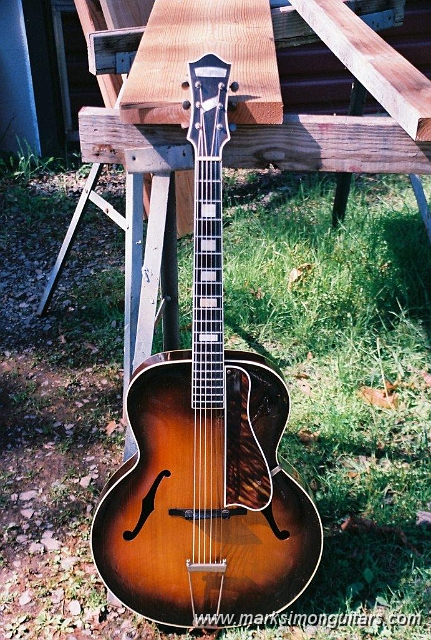 R1-02043-011A.jpg - It was also pretty banged up due to them katzenjammer kidz. All bindings and pickguard 100% original, I was able to melt the numerous dings and scratches with solvent, and a light french polish filled in the crazing.