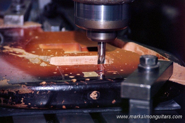 19_0020.jpg - No turning back now. Squaring up the pickup cavity for the filler block.
