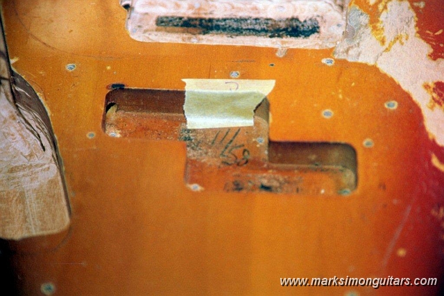 22_0023.jpg - Fender Precision Bass with penciled in 11/58 build date. Notice the enlarged control cavity abomination which was enlarged to accept two more control knobs and a pre-amp!